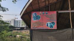 Boat crossing on Thai-Myanmar border at casino, Mae Sot, Tak province, Thailand. By Ashley Scott Kelly, 2024.
